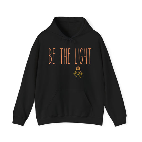 Black hoodie with 'BE THE LIGHT' text 