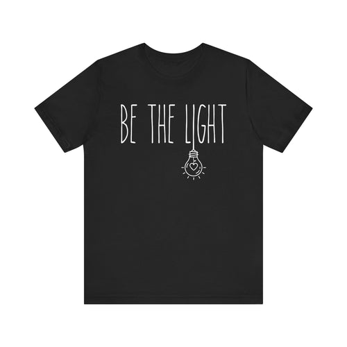 Black t-shirt with 'BE THE LIGHT' text 