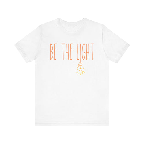 White t-shirt with 'BE THE LIGHT' text 