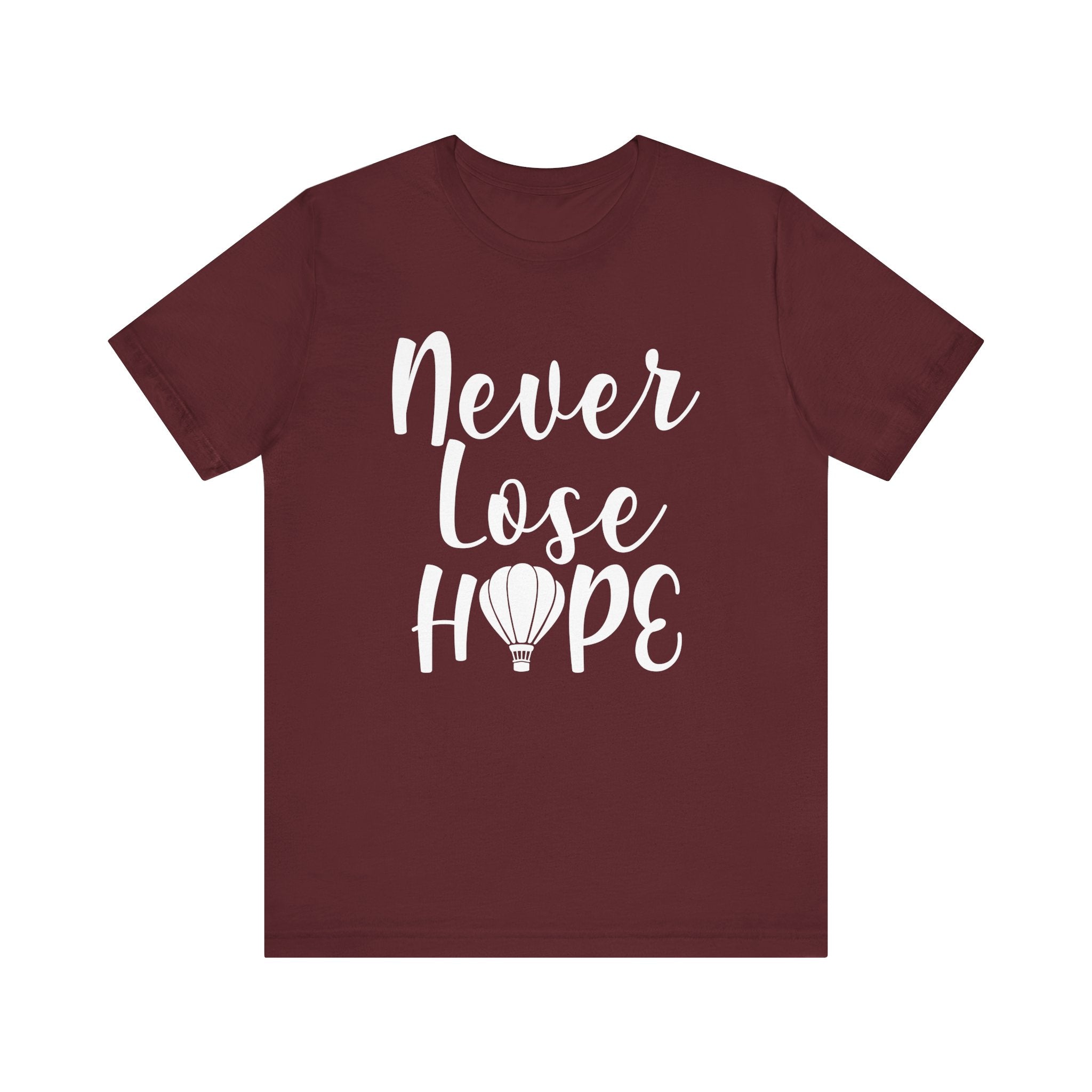 Maroon t-shirt with 'Never Lose Hope' text 
