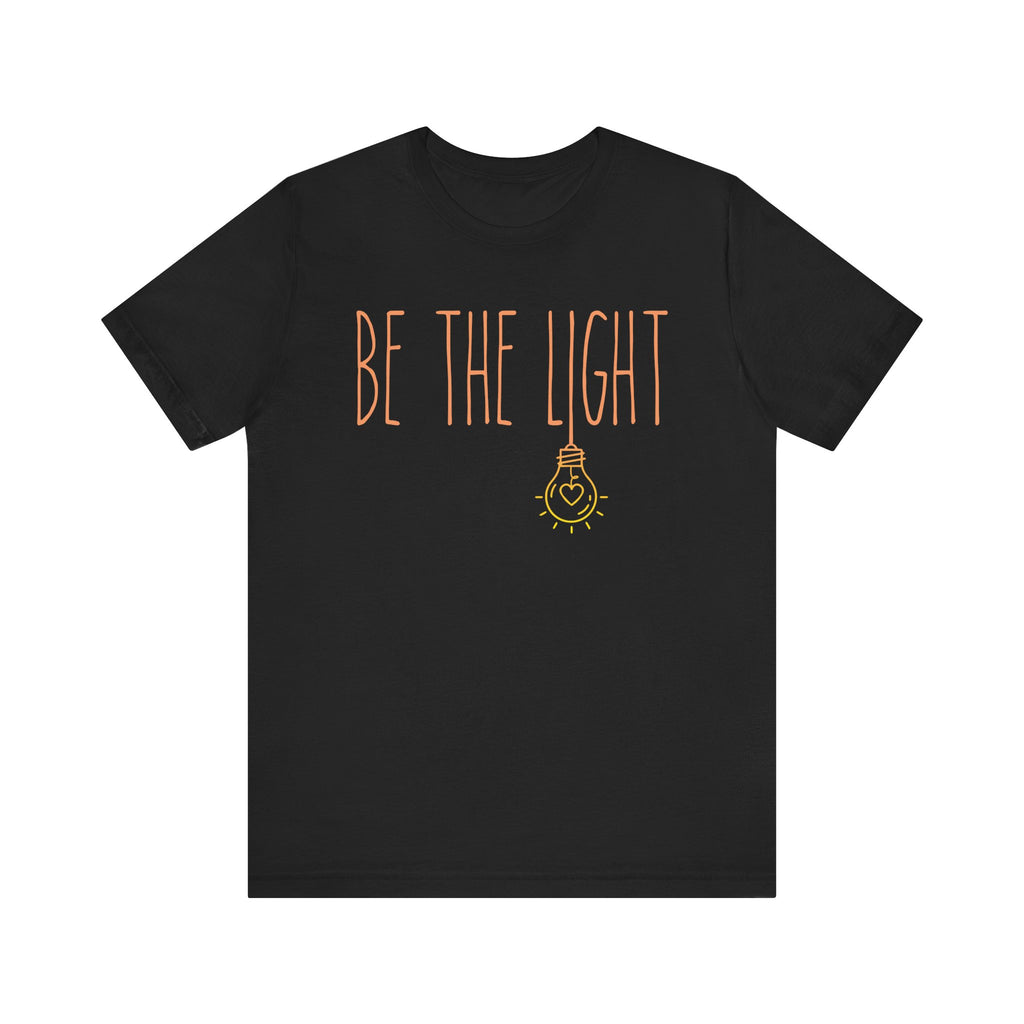 Black t-shirt with 'BE THE LIGHT' text