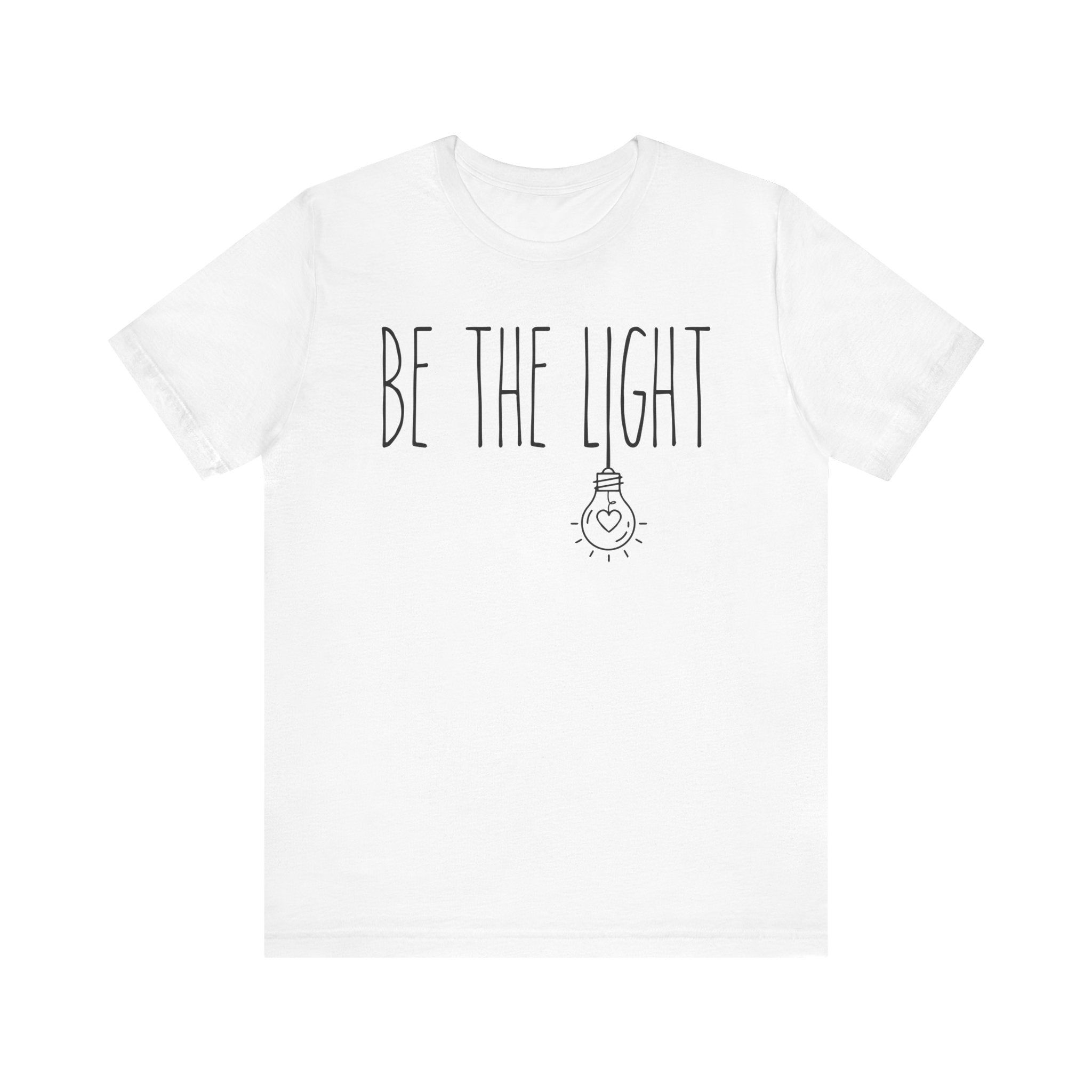 White t-shirt with 'Be the Light' text 