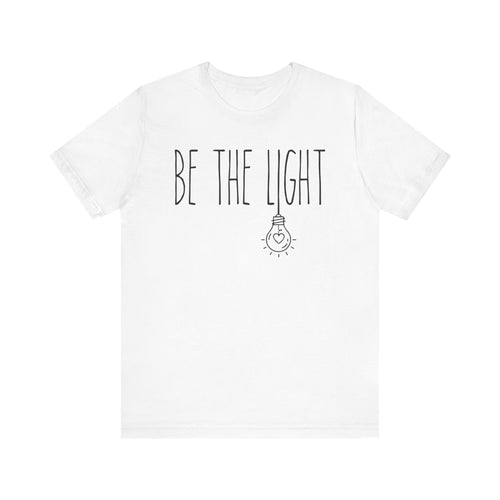 White t-shirt with 'Be the Light' text 